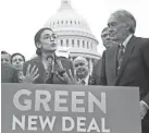  ?? SAUL LOEB/AFP/GETTY IMAGES ?? Rep. Ocasio-Cortez and Sen. Markey, right.