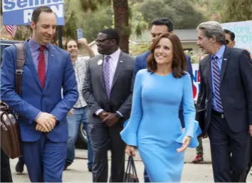  ??  ?? Louis-Dreyfus on the Veep set as vituperati­ve Vice-President Selina Meyer, surrounded by (from left) co-stars Tony Hale, Sam Richardson, Reid Scott and Gary Cole.