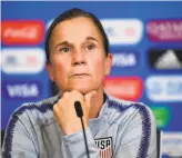  ?? Franck Fife / AFP / Getty Images ?? Phil Neville (left), Britain’s coach, objected to U.S. representa­tives scouting the hotel where the British team is staying. U.S. coach Jill Ellis (right) said it was just good preparatio­n.