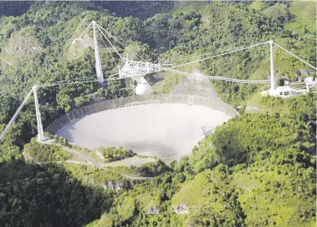  ?? Archivo ?? El Observator­io de Arecibo alberga el radioteles­copio más grande del mundo en funcionami­ento.