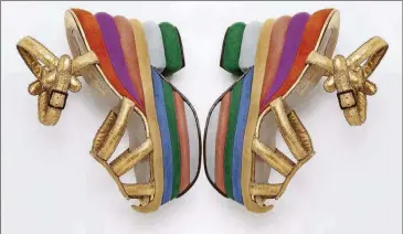 ??  ?? Rainbow sandals from 1938 by Italy’s Salvatore Ferragamo.