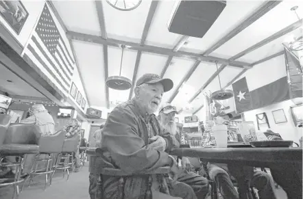  ?? Karen Warren / Houston Chronicle ?? Korean War veteran William “Mr. Bill” Glass, 85, at the VFW Post 4709 in Conroe, says he likes what he sees in President Donald Trump. “He’s not a politician. He’s a businessma­n. And that’s what we needed,” said Glass, echoing many Trump supporters.