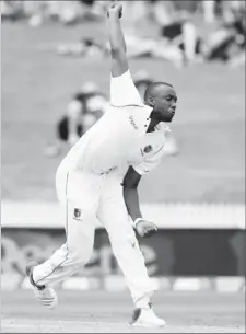  ??  ?? Fast bowler Miguel Cummins celebrates a wicket.