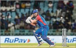  ?? PTI ?? DC’s batter David Warner plays shot during the Indian Premier League match