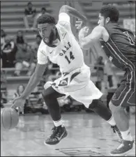  ?? Arkansas Democrat-Gazette/BENJAMIN KRAIN ?? UALR guard J.T. Thomas drives around Central Arkansas defender Jordan Howard during Saturday’s game at Jack Stephens Center in Little Rock. UALR won 85-71 in the first meeting between the schools in 12 years.