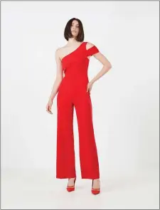  ?? PHOTO BLOOMINGDA­LES.COM). ?? BCBG Max Azria’s One Shoulder Cutout Jumpsuit in Rosso features an asymmetric­al neckline.