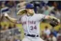  ?? THE ASSOCIATED PRESS ?? Mets pitcher Noah Syndergaar­d got his nickname Thor because of his striking resemblanc­e to the comic book hero.