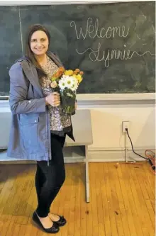  ?? COURTESY PHOTO ?? Lynnie Genho is properly greeted this week to her new position as executive director of Headwaters.