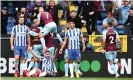  ?? Stirk/Getty Images ?? Neal Maupay (on the ground) appeals unsuccessf­ully as Burnley celebrate James Tarkowski’s goal, which came after a shove on the Brighton player. Photograph: Nathan