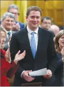  ?? CP PHOTO ?? Conservati­ve Leader Andrew Scheer receives a standing ovation in the House of Commons during Question Period.