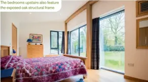  ??  ?? The bedrooms upstairs also feature the exposed oak structural frame