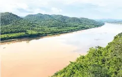  ??  ?? ABOVE
The view of the Mekong River from the skywalk.