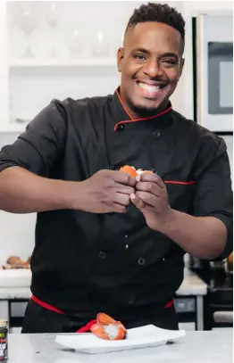  ??  ?? Chef Noel in action in his favourite place, the kitchen.