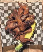  ?? MICAELA WATTS ?? Spicy Jerk Wings at Elwood’s Shack.