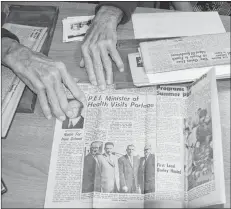  ?? ALISON JENKINS/ JOURNAL PIONEER ?? Dick Wedge holds an article about his father, Summerside MLA Henry Wedge, printed in a Manitoba newspaper.