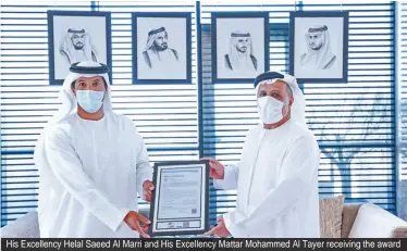  ??  ?? His Excellency Helal Saeed Al Marri and His Excellency Mattar Mohammed Al Tayer receiving the award