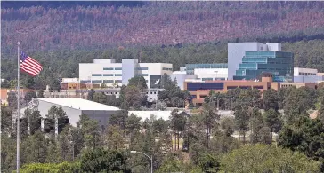  ?? COURTESY LOS ALAMOS NATIONAL LABORATORY ?? A view of Los Alamos National Laboratory in 2020. In two incidents on the same day last month, lab workers set off a decontamin­ation shower, and a technician took radioactiv­e wipes home with him, a government watchdog says.