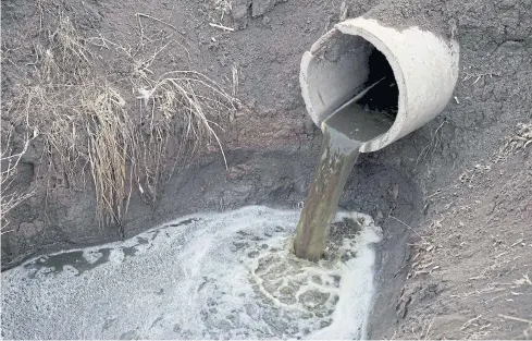  ?? AFP ?? This picture taken on May 3, 2016 shows a pipe carrying waste from a dairy farm in Gannan county, Heilongjia­ng province.