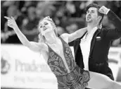  ?? TONY AVELAR/ASSOCIATED PRESS ?? U.S. figure skater Madison Hubbell, left, with partner Zachary Donohue, wears outfits made by her mom.