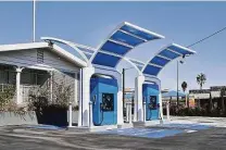  ?? Philip Cheung / New York Times file photo ?? Hydrogen fuel pumps at a gas station sit in Fountain Valley, Calif. The fuel could play a key role in fighting climate change.