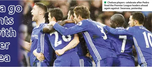  ??  ?? Chelsea players celebrate after Pedro fired the Premier League leaders ahead again against Swansea, yesterday