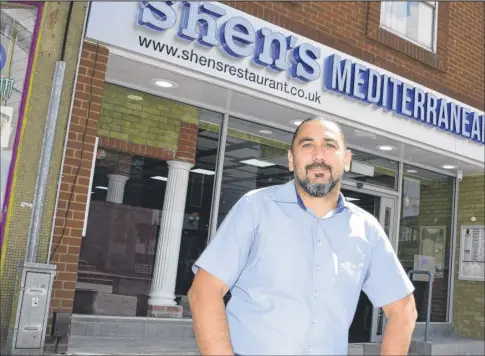  ?? Picture: Paul Amos FM4870604 ?? Shen Sen outside his restaurant in Bank Street, Ashford