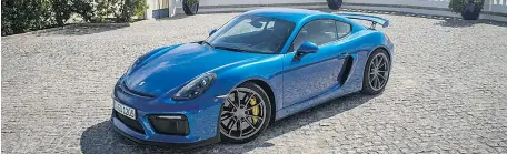  ?? BRENDAN MCALEER/Driving ?? The 2015 Porsche Cayman GT4 has its flaws but that doesn’t do anything to reduce its sales among enthusiast­s — even at $96,500.