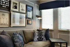  ?? LARRY ARNAL ?? Horizontal blinds preserve views and privacy with a tidy, "urban" look.