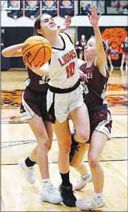  ?? Randy Moll/Westside Eagle Observer file photo ?? Gravette junior Alexa Parker shoots under the basket during play against Huntsville on Jan. 20 in the Lions Den.