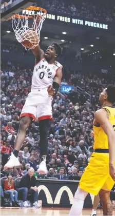  ?? NICK TURCHIARO/ USA TODAY SPORTS ?? Raptors guard Terence Davis slams a dunk-shot Sunday in Toronto’s 127-81 win over the Indiana Pacers.