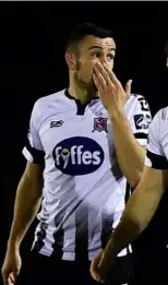  ??  ?? The Dundalk players celebrate Ronan Murr