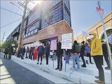  ?? Chris Votek ?? THE UNION of Musicians and Allied Workers protests at Spotify headquarte­rs in downtown Los Angeles.