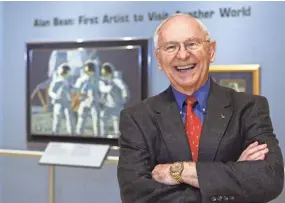  ?? HARRY CABLUCK/AP ?? Alan Bean, the Apollo and Skylab astronaut and an accomplish­ed artist, died Saturday at age 86.