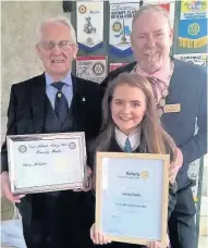  ??  ?? Recognitio­n Fundraiser Jenny Cook with Eddie Robertson, left, and rotary club president Bruce Gunn