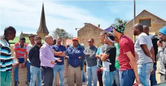  ?? Photos: Nickey le Roux ?? The provincial leader of Icosa, Councillor Dawid Kamfer (fifth from left), addressed unemployed people who claimed Mossel Bay residents were excluded from jobs in the current PetroSA shutdown.