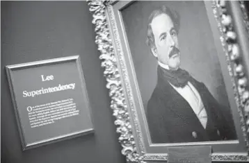  ?? EDUARDO MUNOZ ALVAREZ/AP ?? West Point cadets are taught that Confederat­e soldiers were no heroes, yet the references to Confederat­e Gen. Robert E. Lee, who graduated from the academy and is seen above in a painting at its museum, remain.