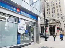  ?? DOUG ALEXANDER/BLOOMBERG ?? BMO Harris Bank’s growth strategy includes converting more locations in Chicago to “smart branch” outlets.