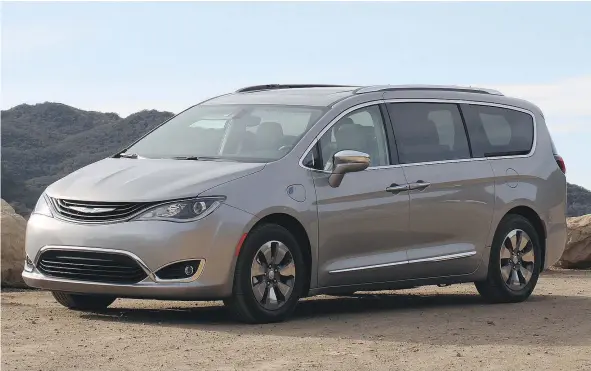  ??  ?? 2017 Chrysler Pacifica Hybrid is one of the newest examples of the spread of electric vehicle technology to the mainstream.