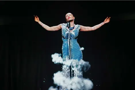  ?? CHRISTOPHE­R KATSAROV/THE CANADIAN PRESS ?? Hologram performanc­es such as this one of Billie Holiday in Toronto in 2018, are becoming increasing­ly common, but many artists question the ethics of the practice.