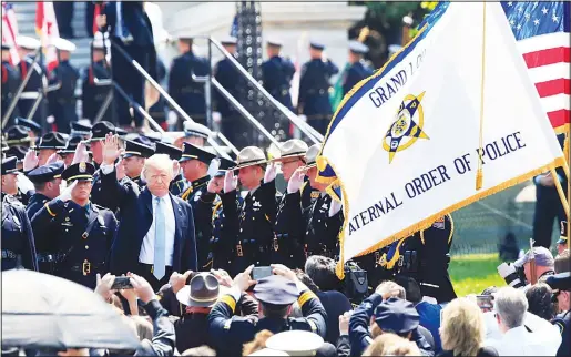 ??  ?? President Donald Trump waves as he arrives at the 37th Annual National Peace Officers’ Memorial Service on Capitol Hill in Washington on May 15. (AP)