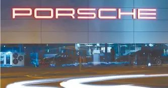  ?? AFP-Yonhap ?? This file photo shows the Porche logo at the Porsche headquarte­rs in Stuttgart, German, Aug. 2, 2016.