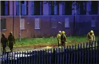  ?? Pictures: Colin Mearns ?? Left and above, fire crews cordon off the scene to tackle the blaze