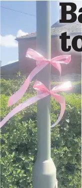  ?? Pink ribbons have become one of the symbols of the tragedy ??