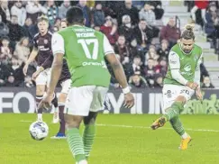  ?? ?? Right, Lawrence Shankland celebrates after making it 1-1 from the penalty spot during last night’s Edinburgh derby at Tynecastle Park. Above, Emiliano Marcondes fires home the opener for Hibs