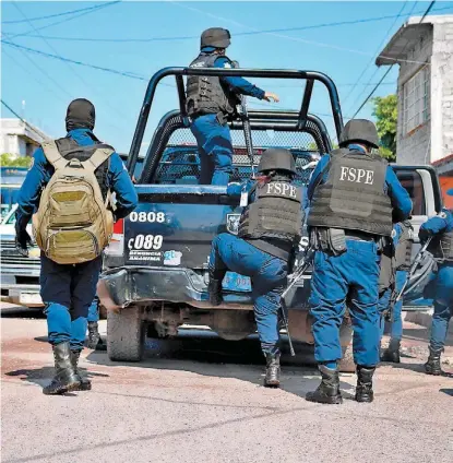  ?? DANY BÉJAR ?? Integrante­s de las Fuerzas de Seguridad Pública del Estado.