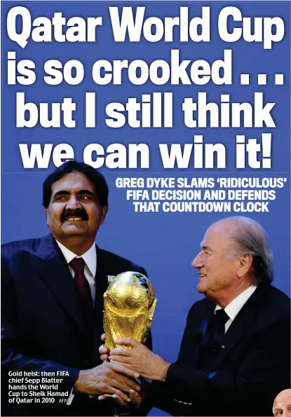  ?? AFP ?? Gold heist: then FIFA chief Sepp Blatter hands the World Cup to Sheik Hamad of Qatar in 2010