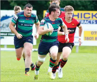  ?? ?? Breaking out of defence, Valley’s Callum Smyton scans the back line for options