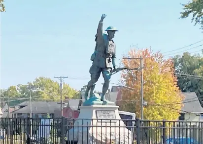  ?? KAREN SORENSEN/COURIER-NEWS ?? “Over the Top,” the WWI Doughboy statue at Memorial Park at Villa and Prairie streets in Elgin, is pictured in September. A similar monument was placed in a park in Chicago’s West Pullman neighborho­od but has since disappeare­d.