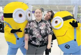  ??  ?? Minion characters in Runcorn Shopping City with Katie Rosealeer, front, and Stacey Wood, back