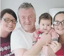  ??  ?? Stewart Anderson, pictured holding granddaugh­ter Neve Allcroft, with daughters Kelly Beston, left and Kay Allcroft.